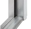 Corner of an A1 aluminum door frame showing the mill finish with white flange installed