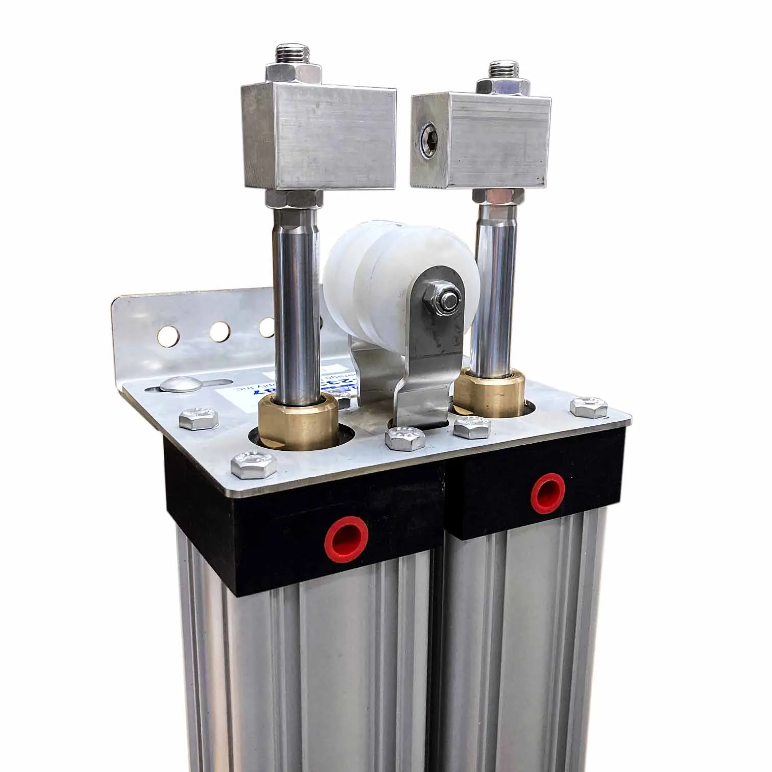 Top of a Supralift dual cylinder assembly showing two aluminum cylinders, piston rods with brass glands, a white sprocket, and a stainless mounting bracket