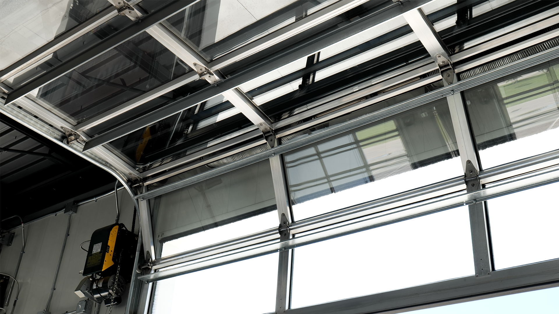 UltraClear glass door and overhead hardware shown as reference imagery
